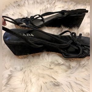 Prada black suede platform sandals.